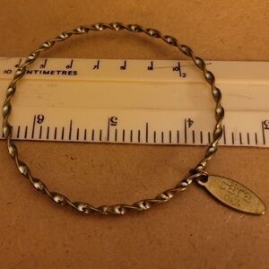 Cara NY bangle gold tone with twist